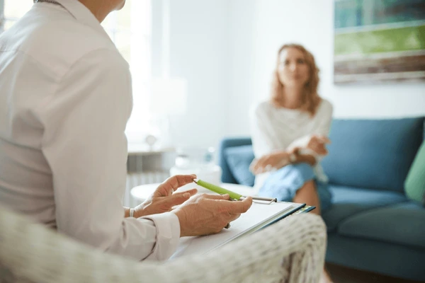 counseling-therapy-session-psychologist-doctor-600nw-2291512991 counseling-therapy-session-psychologist-doctor-600nw-2291512991
